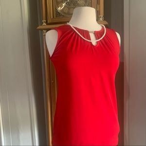 Red sleeveless New York & Co. blouse